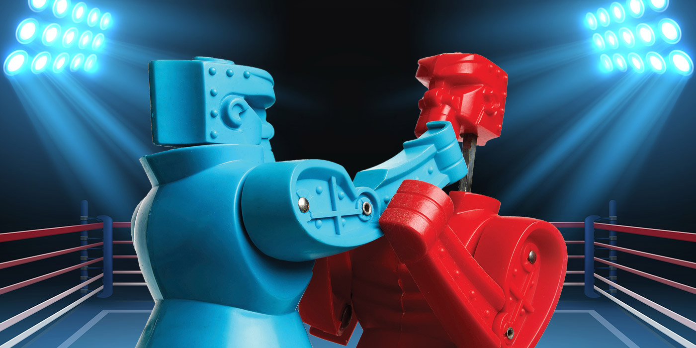 Red and Blue toy robots boxing
