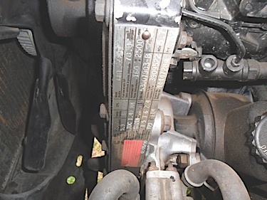 the cummins engine ­specs tag is located on the side of the front cover of the engine. the i.d. tag will list the size, model, horsepower rating, timing, ­firing order, etc.