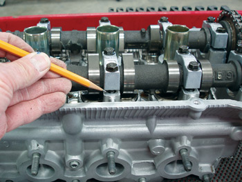 photo 3: if the camshaft bearing journals must be loosened to allow the shaft to rotate against normal valve spring ­tension, the cylinder head might need straightening or ­replacement.