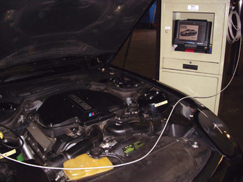 pictured is the bmw factory  diagnostic tool, the gt-1, which is a necessity in servicing today’s cars. it’s connected to a very rare bmw z-8.