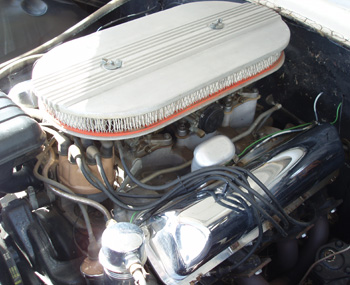 Photo 3: This classic 406 cubic inch, 405 horsepower Ford engine from 1963 features three two-barrel carburetors, solid mechanical lifters, 11.25:1 compression ratio and dual-point ignition. This engine could accelerate a two-ton Ford sedan to 113 mph in 12.6 seconds in the quarter-mile.